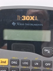 TEXAS INSTUMENTS TI-83 PLUS ,AND A TEXAS INSTRUMENTS TI-30X A WITH COVERS,BOTH