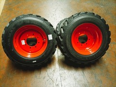 4 New 10-16.5 16PR R-4 Super HD Skid Steer Tires on 16.5×8.25 Orange Steel Rims