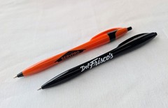 30 Misprint Click Pens JAVALINA Hub Pen Lot Halloween Theme Color ORANGE & BLACK