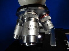 Omax Four Lens With Slide Stage Microscope Lightg and Aperature Control Good Use