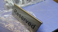 6 – Update International RES-5/SS Reserved Table Sign – Black Lettering 2″ x 4-3