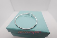 Gift.Tilffany & Co Wire bracelet in white gold and diamonds