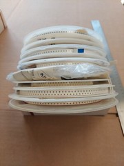 lot of 10 surface mount 0603 capacitor reels, various values