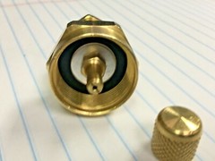 CGA600-R12 to 1/4″ Male Flare With On/Off Valve, Gauge & Brass Cap