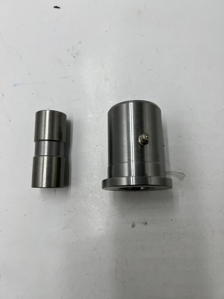 Sleeve and Bushing 2 1/4 Inches Long 2 Inches Diameter Silver