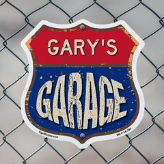 Gary’s Garage Shield Shaped Sign Weather Resistant Crafted in the USA