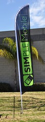 TWO “Simple Mobile” Feather Banner Flag Sets – POLE SETS INCLUDED w/ spikes